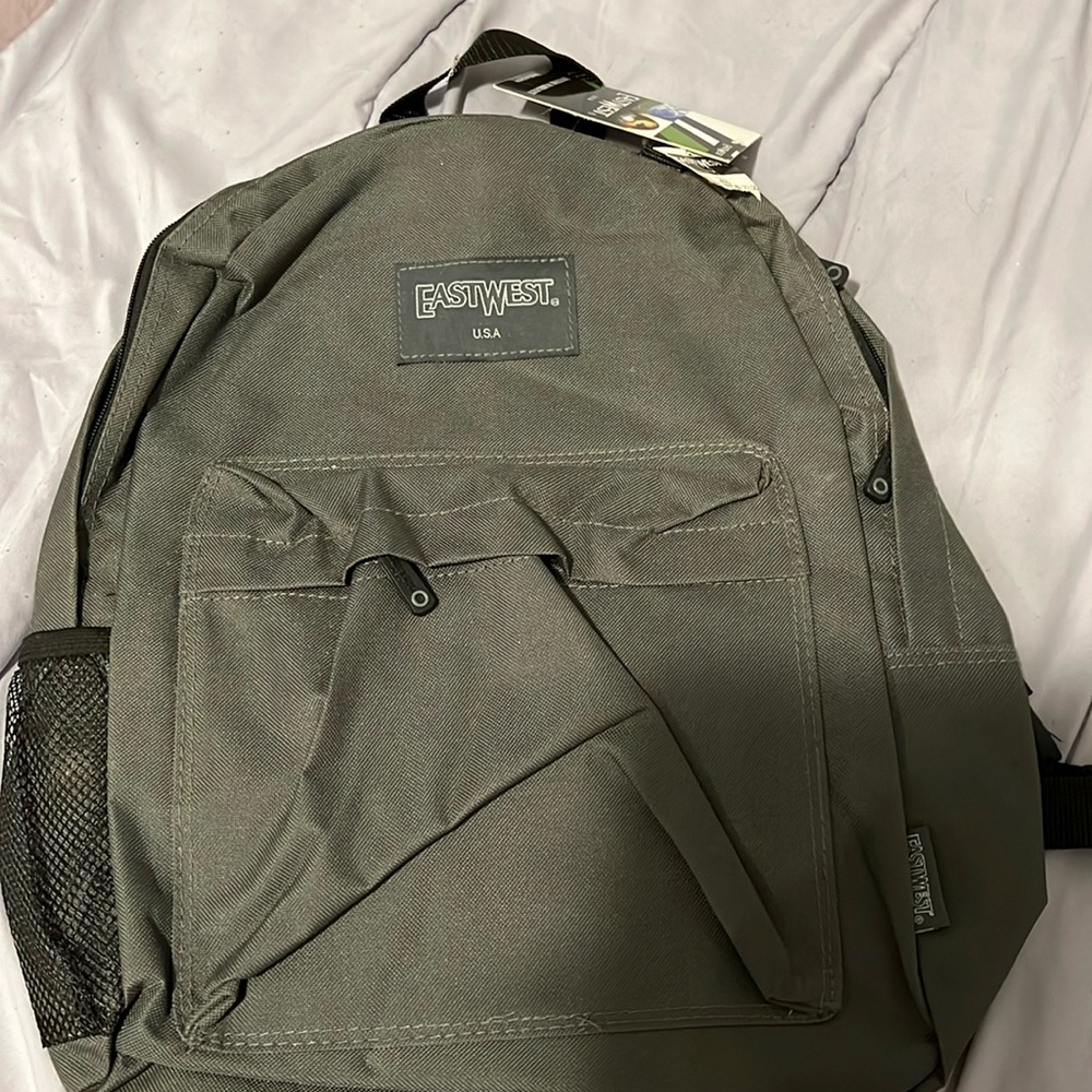 East west back pack new with tags